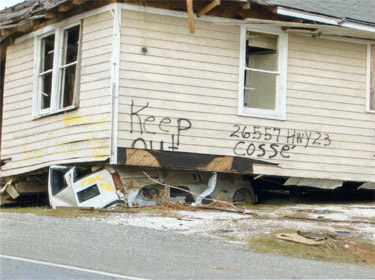 Hurricane Katrina damages home in Port Sulphur Louisiana